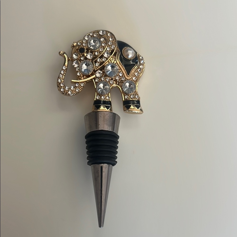 Elegant Gold and Black Elephant Bejeweled wine stopper.